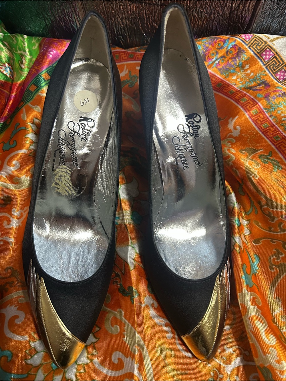 Salvatore Ferragamo Black Pumps with Gold Cap Toe